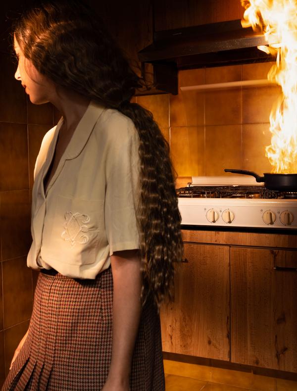 Tania Franco-Klein, Pan, Fire, Kitchen (self-portrait), 2022