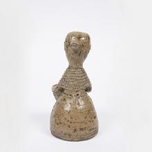 Femme à la cape tricotée et au tablier à carreaux (bouquetière), 1954