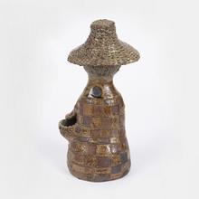 Femme à la robe à carreaux noirs (Bouquetière), 1956