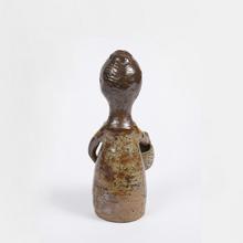 Femme avec chignon devant (Bouquetière), 1957