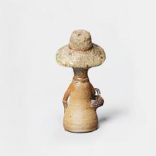Bouquetière au grand chapeau et au tablier, c. 1961