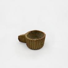 Tasse carton e, 1974