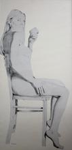 Nu sur une chaise