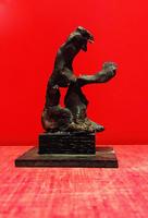 Face à face deux silhouettes, socle double en bois noir